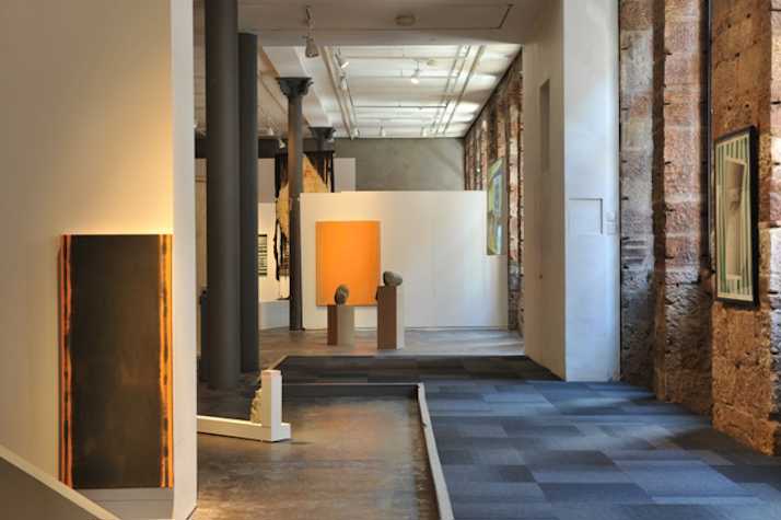various artworks and installations in a gallery space