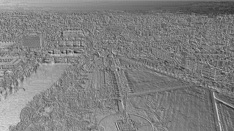 An embossed images of a cityscape.