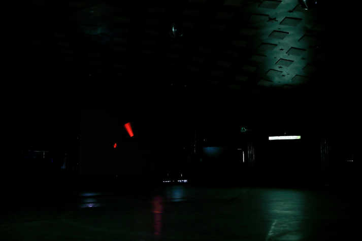 Installation view, darkened room