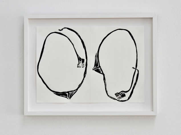 framed mono print of a string like piece of fabric