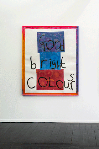 The image shows a large collage print with cut out paper that reads 'Good bright colours'