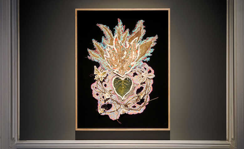 A black background with an collaged design with a flame shape at the top
