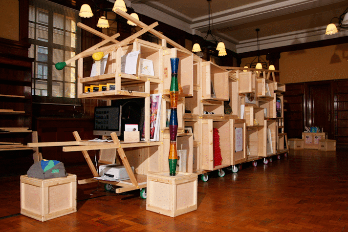 large fun wooden shelves with eclectic items placed on them