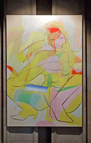 a large scale canvas hangs on a stone column. Fast lines depict a figure crouched in pointed heels, their arm across their chest and hand resting on their face they look out at the viewer. Blocks of yellow, pale pink, blue, green and red are layered through