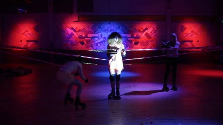 Illuminated figures in dark space