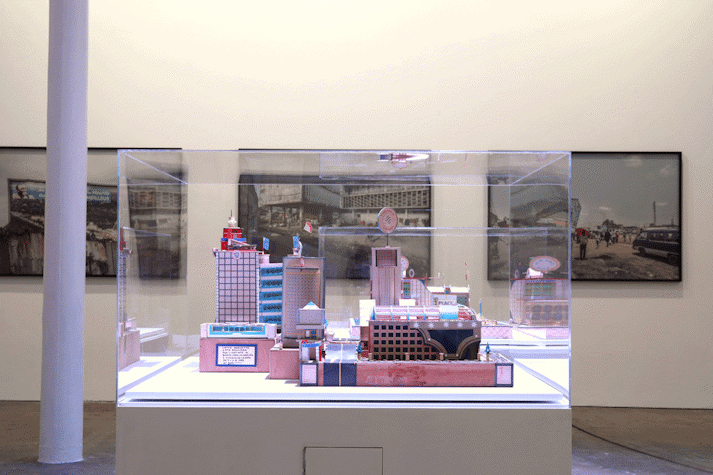 Installation view, photographs from the series Urban Now and sculptures of imagined buildings