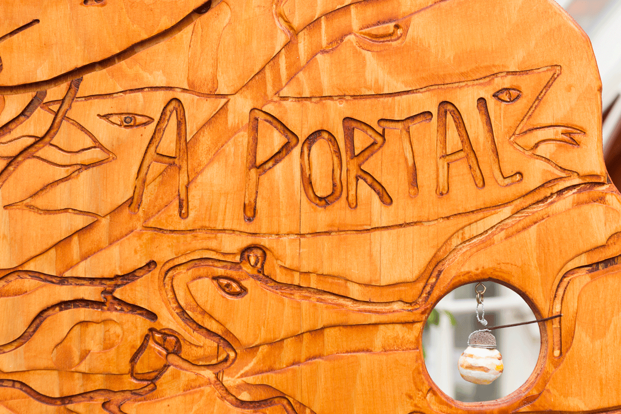 Close up view of the surface of a panel with the words A Portal visible