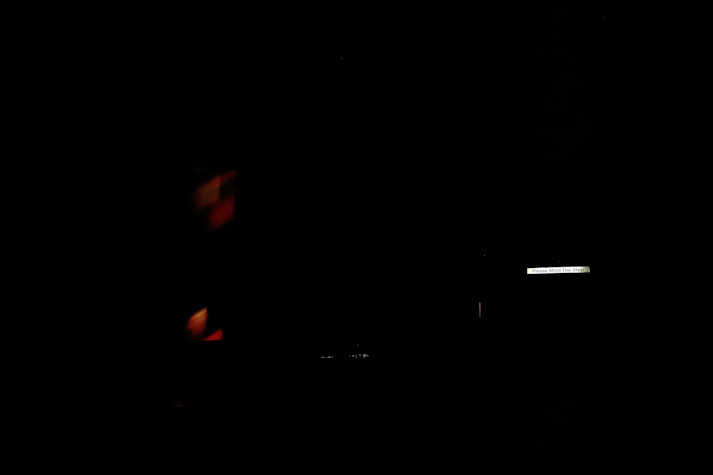 Installation view, darkened room