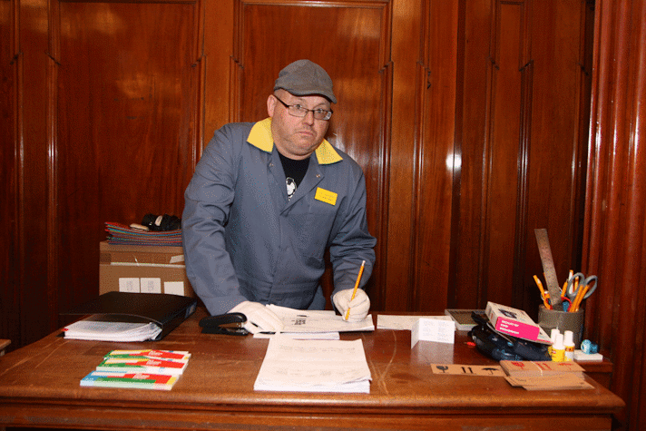 art lending 'librarian' working behind their desk