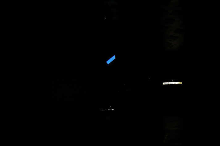 Installation view, darkened room