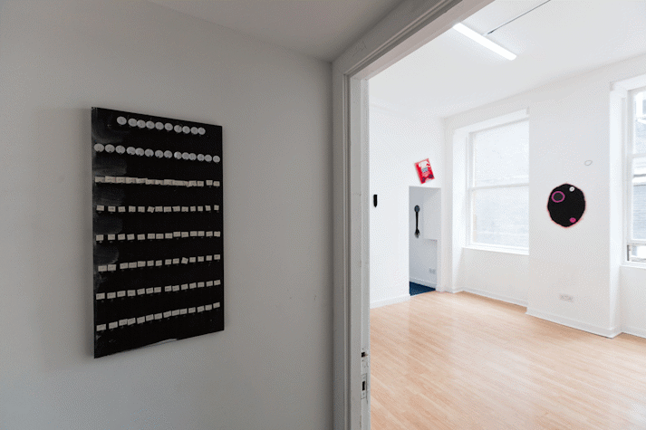 print hangs on white wall