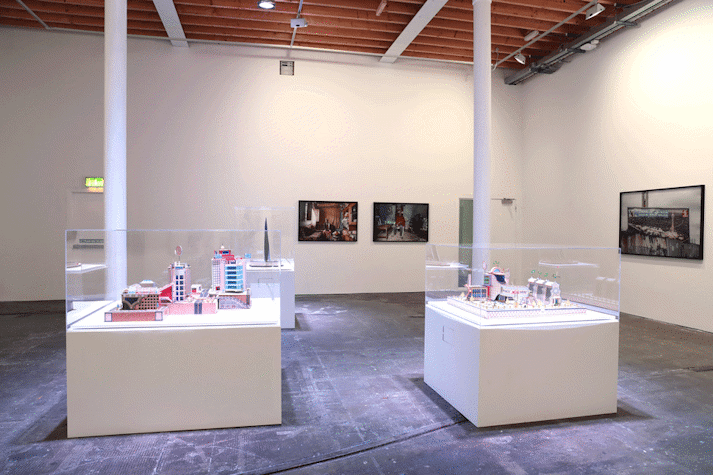 Installation view, photographs from the series Urban Now and sculptures of imagined buildings