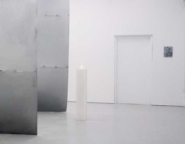 installation view of David dale gallery, there is a large metal sheet forming a structure on the left, and a narrow plinth just to the right of it. on the far right there is a work on the wall.