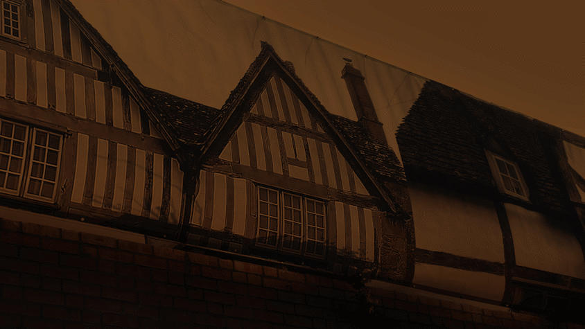 sepia toned image of old building