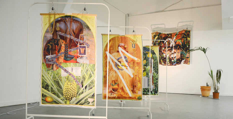 A photograph of sculptural works in a white gallery space