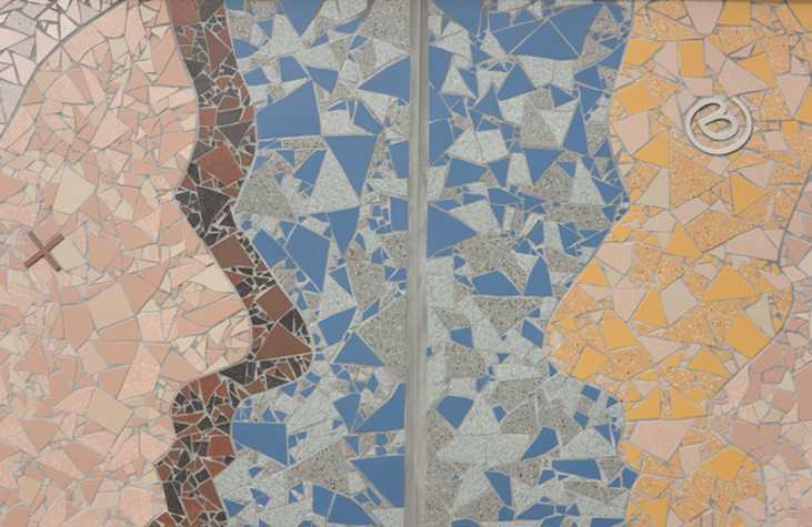 detail of a mosaic of two peoples profiles facing each other