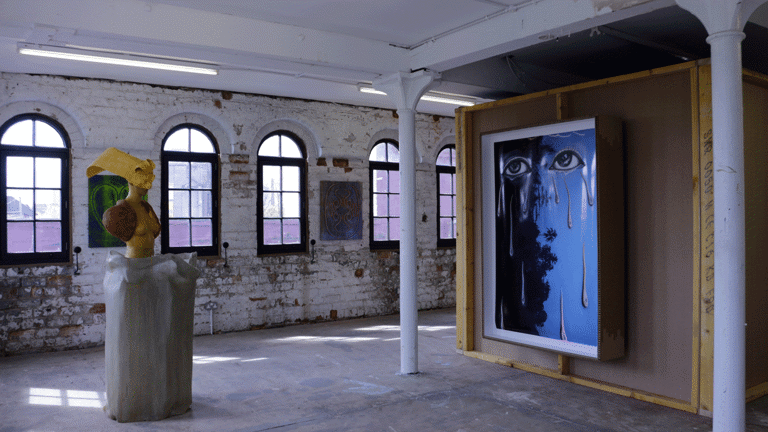 Gallery installation, structural piece mounted on platform, painting hung within a wooden structure, number of windows situated across the gallery space