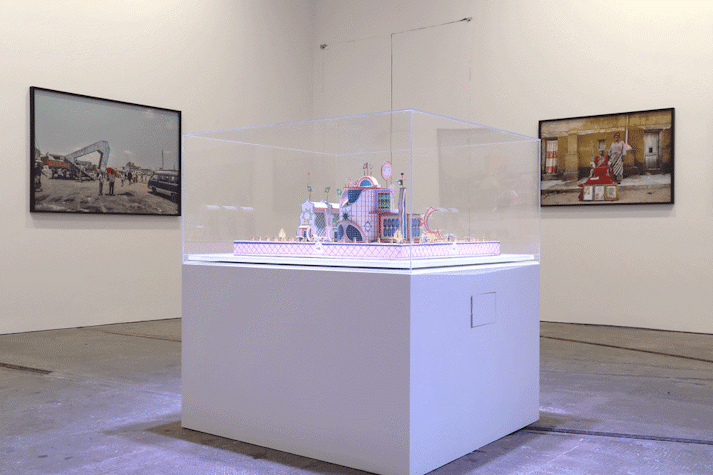 Installation view, photographs from the series Urban Now and sculptures of imagined buildings